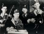Original Light Crust Doughboys (L-R) Bob Wills, Truett Kimsey (Announer KFJZ), Milton Brown & Herman Arnspiger (Spring 1931) - photo courtesy of Marvin Montgomery (38kb)